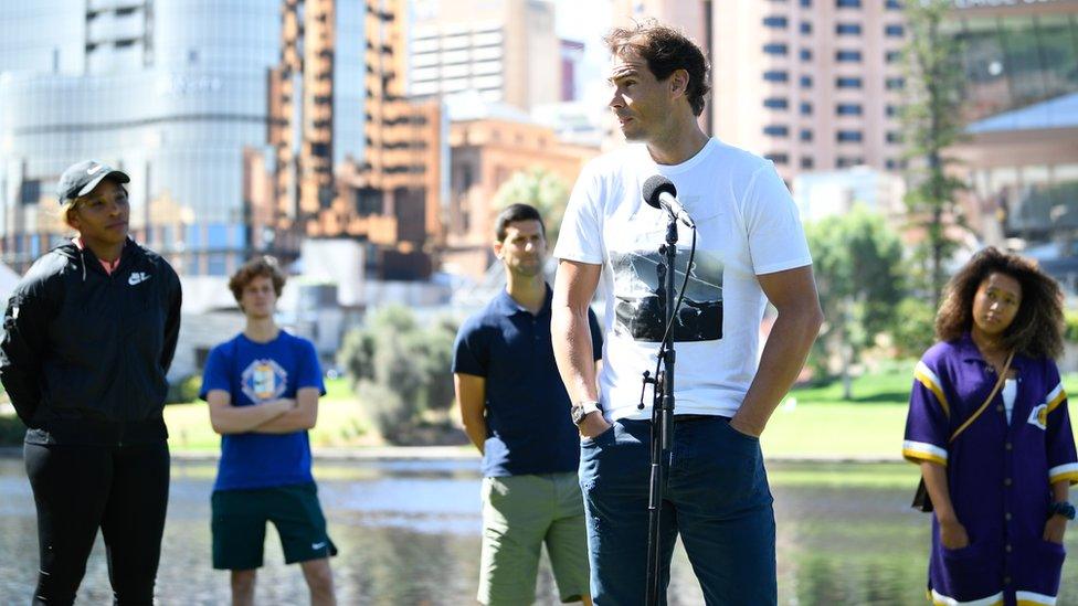 (L-R) Serena Williams, Jannik Sinner, Novak Djokovic, Rafael Nadal and Naomi Osaka at an outdoors press conference in Adelaide following their release from quarantine