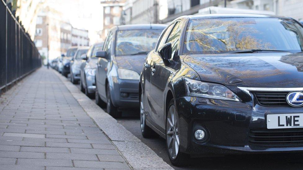 Cars parked on street