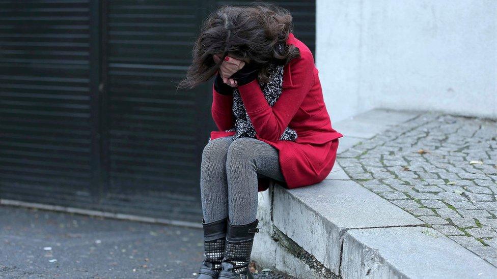 A former employee of the Reina nightclub reacts outside following an attack by a gunman in Istanbul, Turkey, January 1, 2017