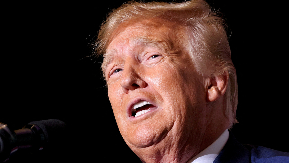 Former US President Donald Trump speaks at a campaign event in Iowa on 7 July