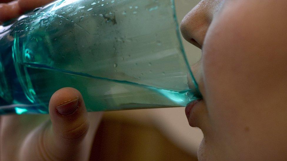 Child drinks water