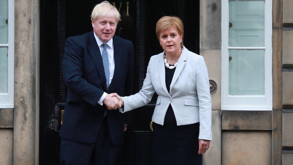 Prime Minister Boris Johnson (L) meets with Scotlands First Minister Nicola Sturgeon at Bute House, Edinburgh,