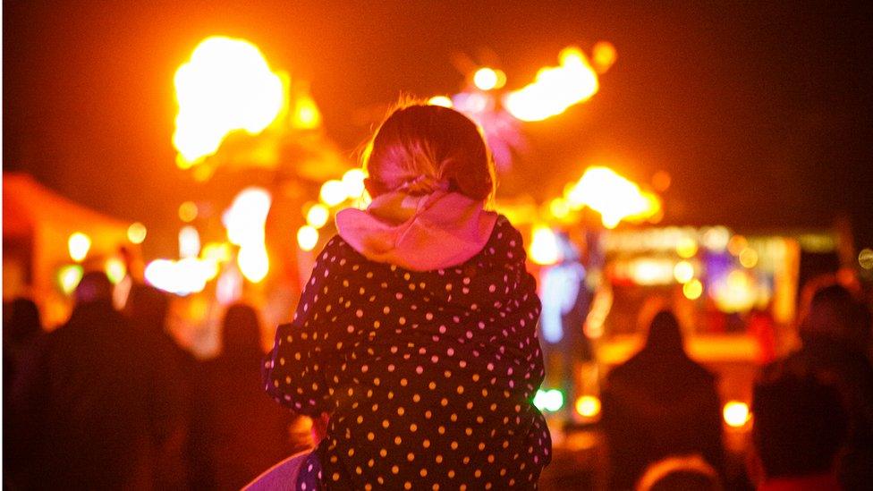 The back of a girl's head at the Fire on the Water festival in Great Yarmouth