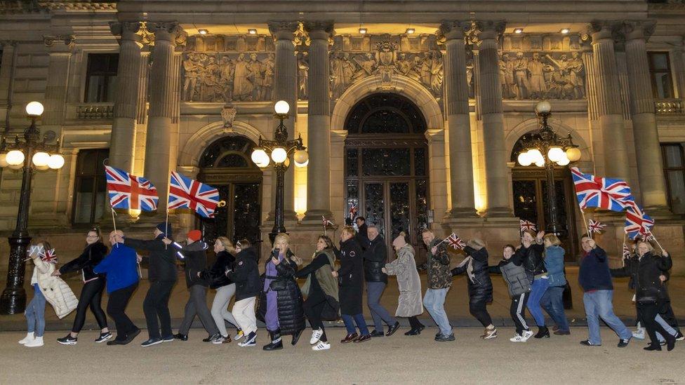 Unionists appeared to dance a conga as they gathered in central Glasgow to celebrate Ms Sturgeon's resignation