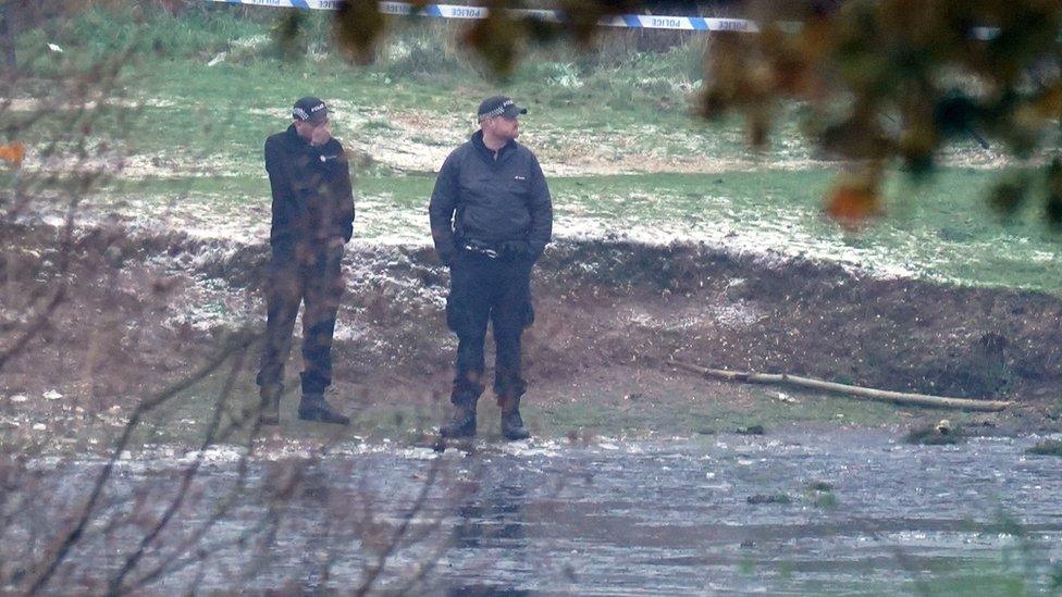 Police officers at the scene in Babbs Mill Park in Kingshurst, Solihull