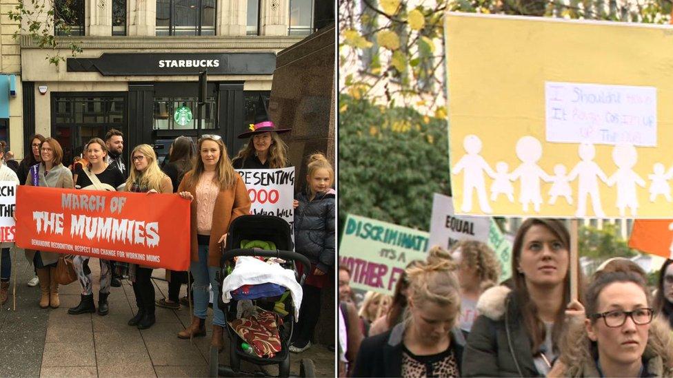 Women holding banners