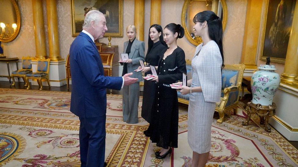 King Charles presented the k-pop band Blackpink with special awards, recognising their work highlighting environmental issues.