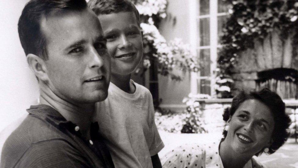 George W Bush is shown with his father, future President George H W Bush and mother, future first lady Barbara Bush in Rye, New York in 1955.