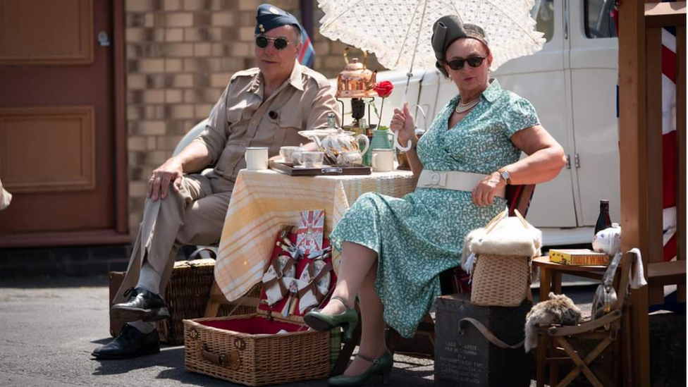 Railway enthusiasts in 1940's costume