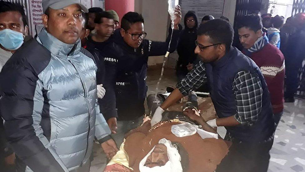 An injured Nepali passenger is transported to a hospital in Dang district, south-west of Kathmandu, on December 22, 2018