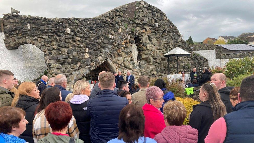 People at the vigil for the crash victims in Strabane