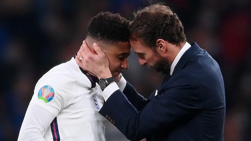 England manager Gareth Southgate consoles Jadon Sancho