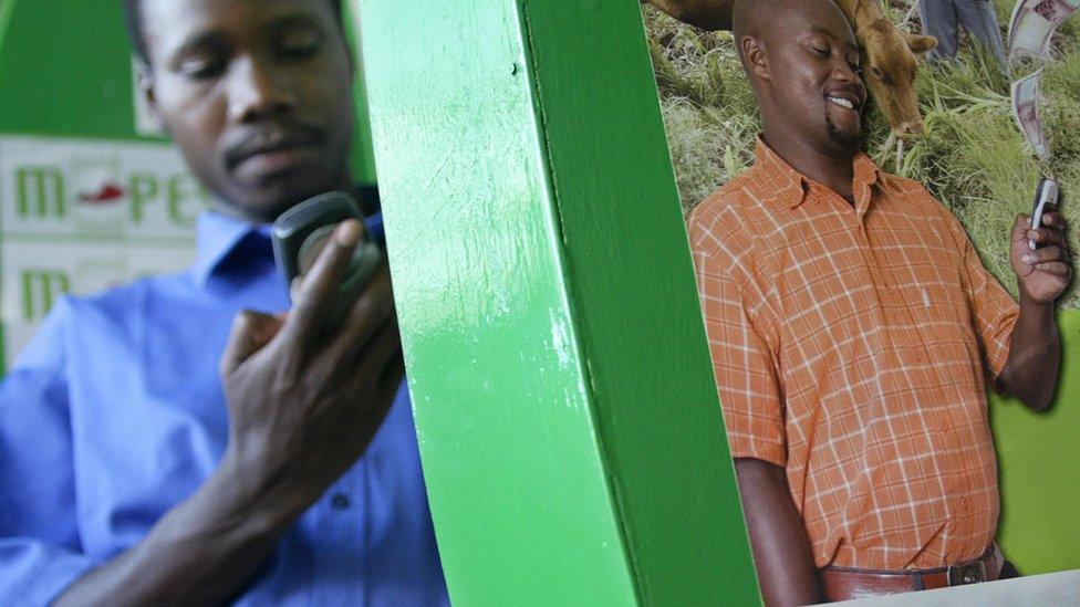 A man sending money through M-Pesa in Kenya's capital, Nairobi