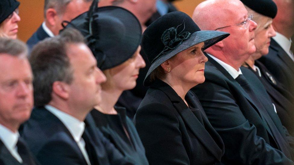 British prime minister Liz Truss (l) and Scotland's First Minister Nicola Sturgeon (r) attended the service of thanksgiving for the Queen.