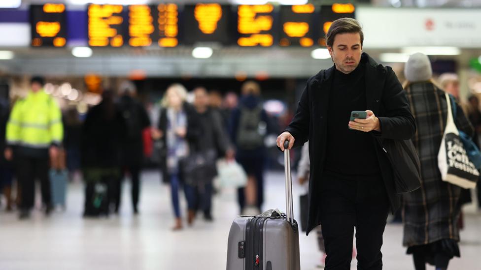 Man at train station