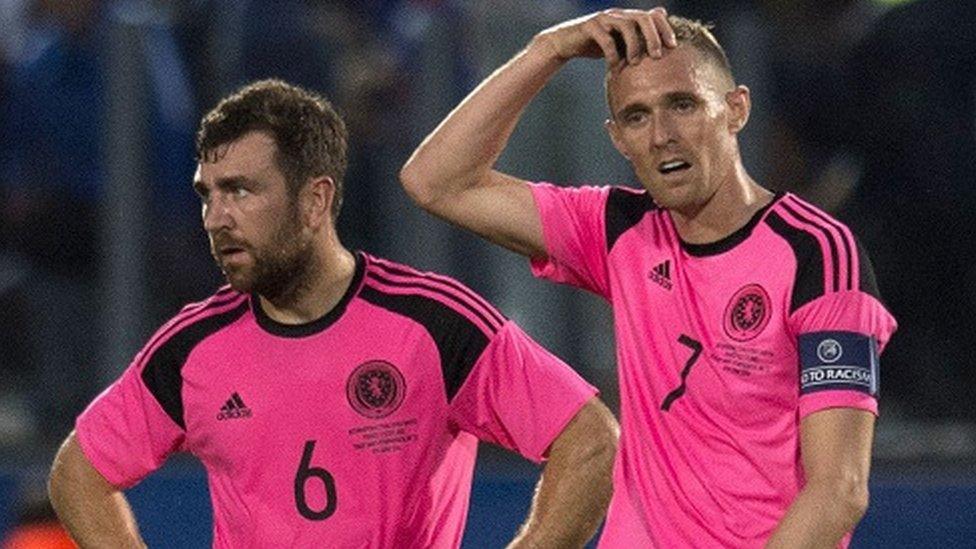 Scotland's James McArthur and Darren Fletcher show their disappointment