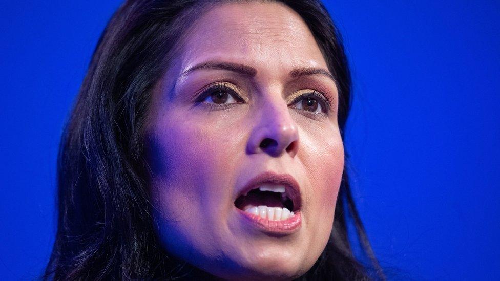 Priti Patel speaking at the policing summit