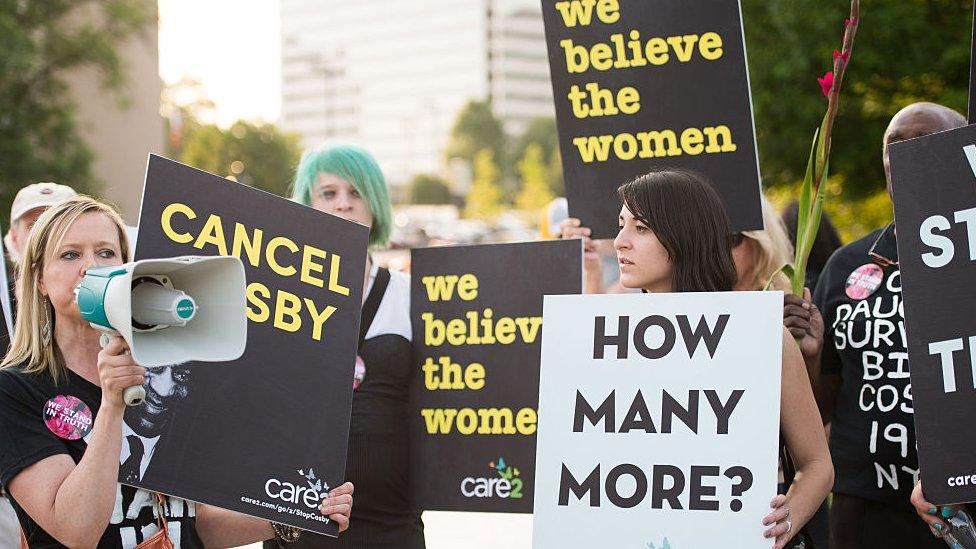 Brandy Betts gathers with protestors outside of Bill Cosby's 'Far from Finished' Tour at Cobb Energy Performing Arts Center