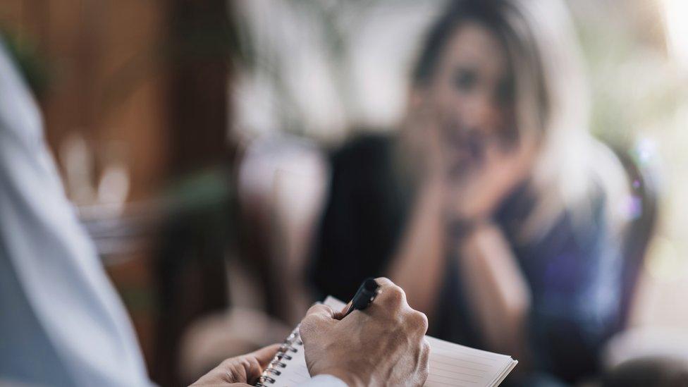 A woman receiving counselling (stock image)