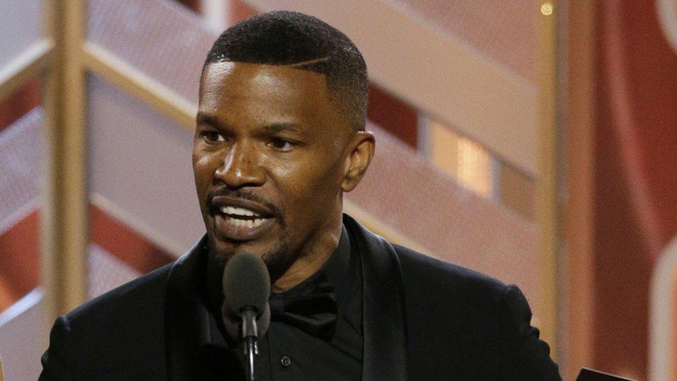 Lily James and Jamie Foxx onstage during the 73rd Annual Golden Globe Awards at The Beverly Hilton Hotel on Beverly Hills, California 10 January 2016