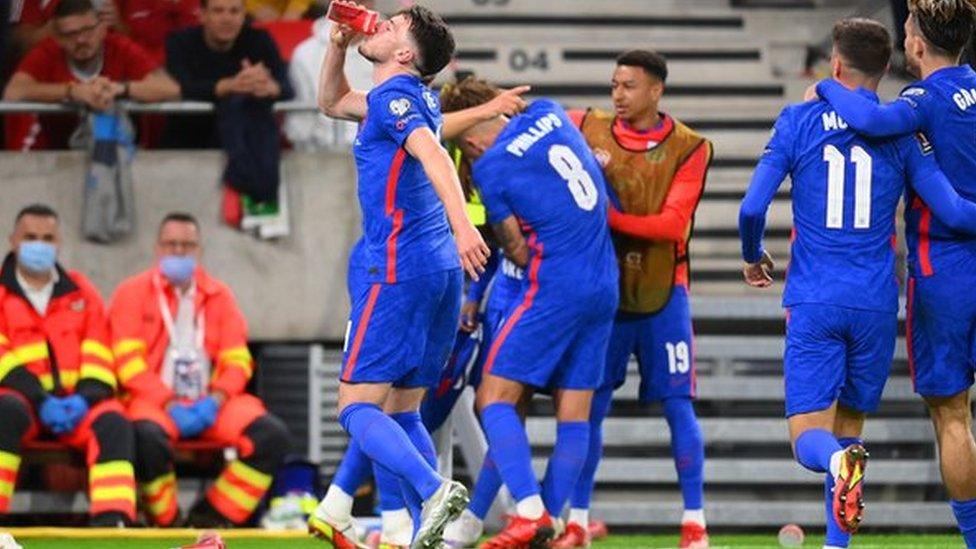 Declan Rice took a drink from a cup thrown at Raheem Sterling