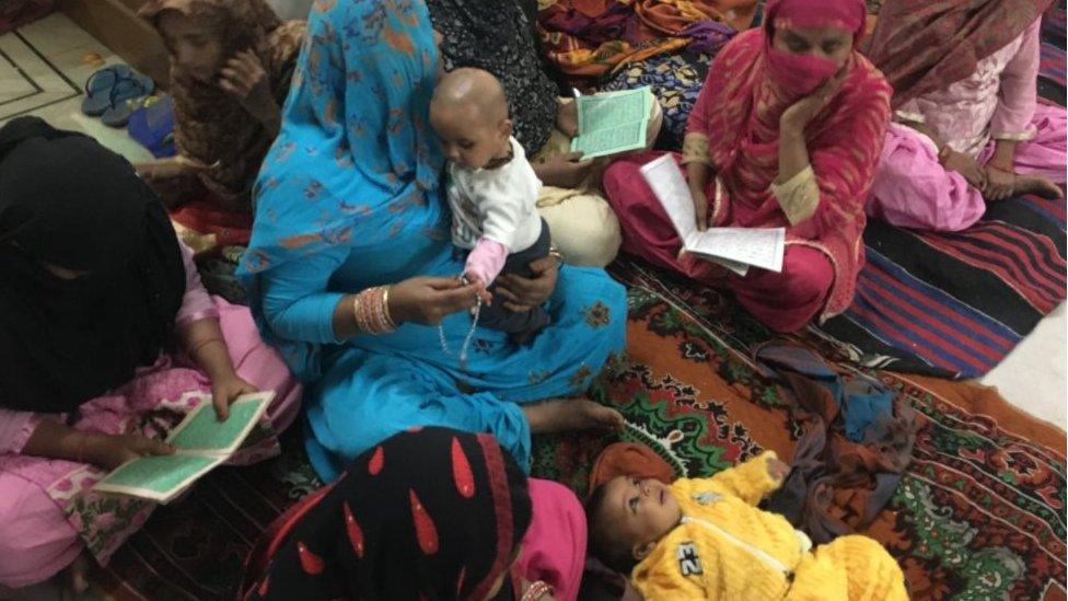 Women and children inside the shelter