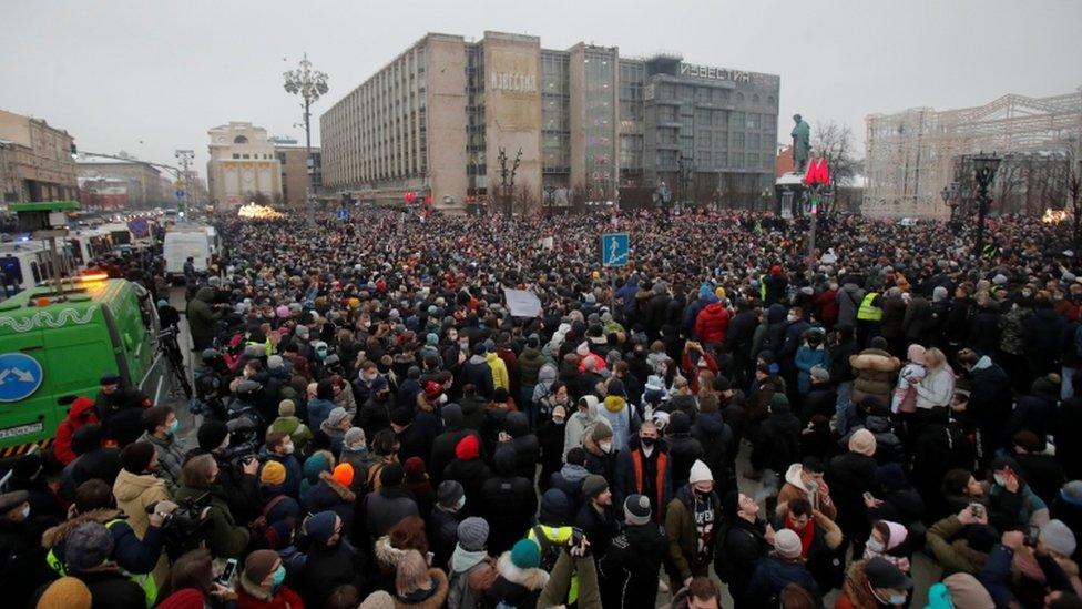 People attend a rally in support of jailed Russian opposition leader Alexei Navalny in Moscow