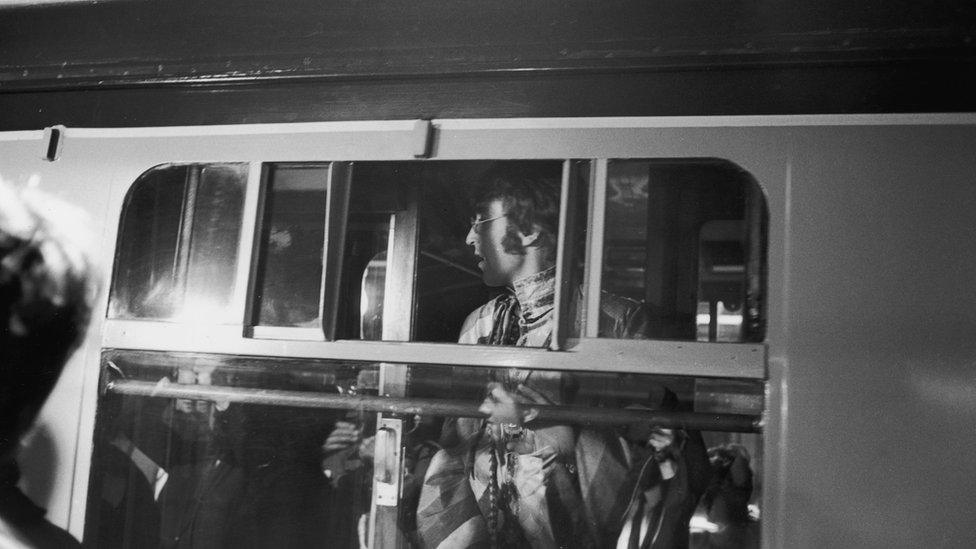 John Lennon shortly before the train's departure from Euston Station to Bangor on 25 August 1967