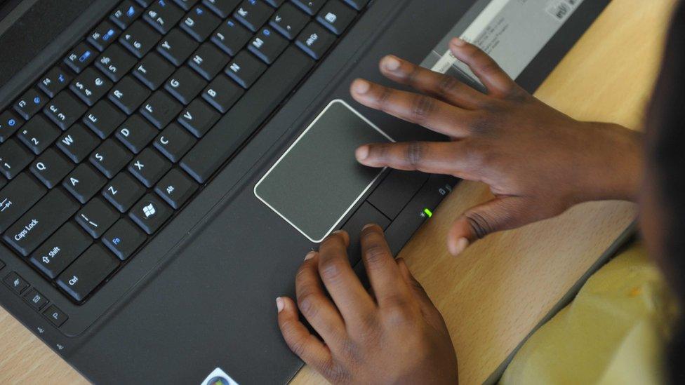 child using laptop