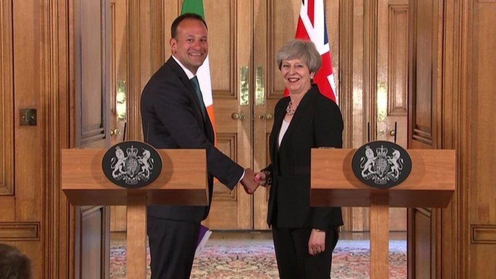 Varadkar and May shaking hands