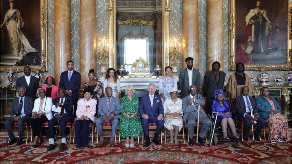 King Charles III and Queen Camilla with members of the Windrush generation during a reception at Buckingham Palace