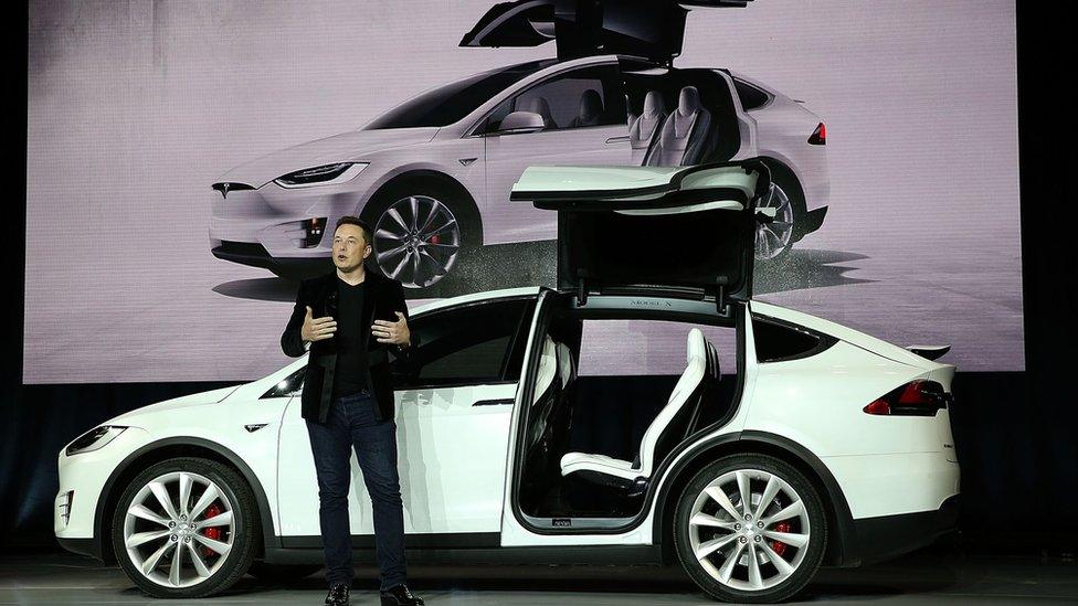 Tesla chief executive Elon Musk speaks during a company launch event