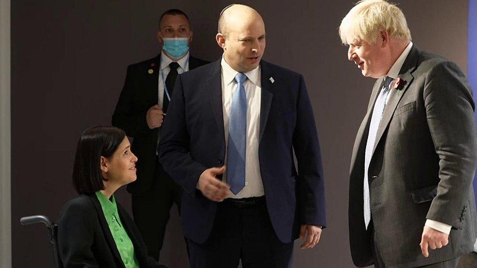 Karine Elharrar, Naftali Bennett and Boris Johnson