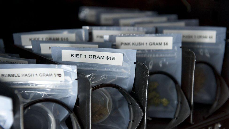 A variety of bags of marijuana are displayed in a vending machine at the BC Pain Society in Vancouver, BC, May 12, 2014.