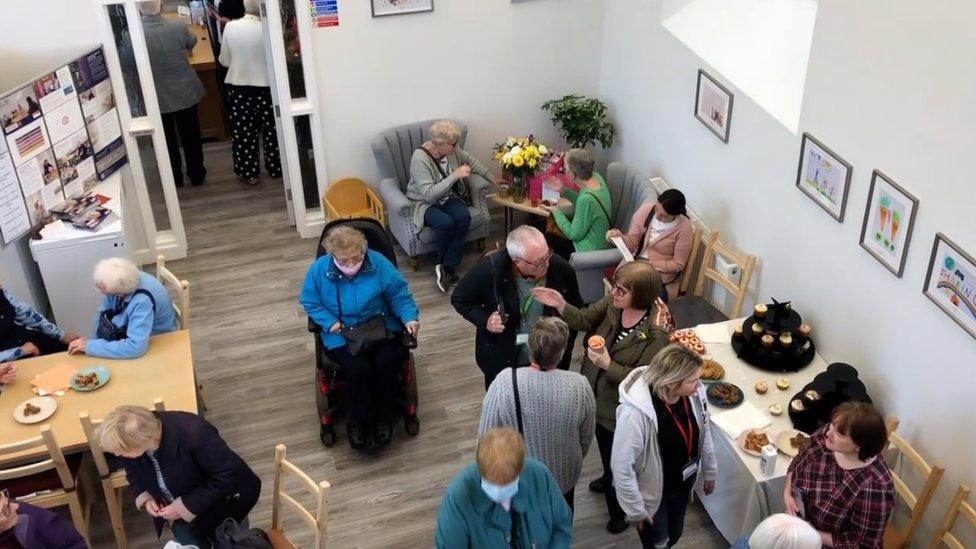 People visiting the new food bank