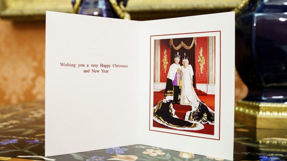 King Charles and the Queen's Christmas card features a picture of them posing with their crowns at the Coronation earlier this year