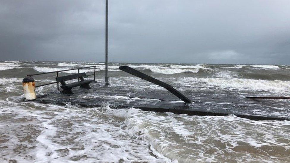 The broken-off section of the Frankston Pier in the rough surf