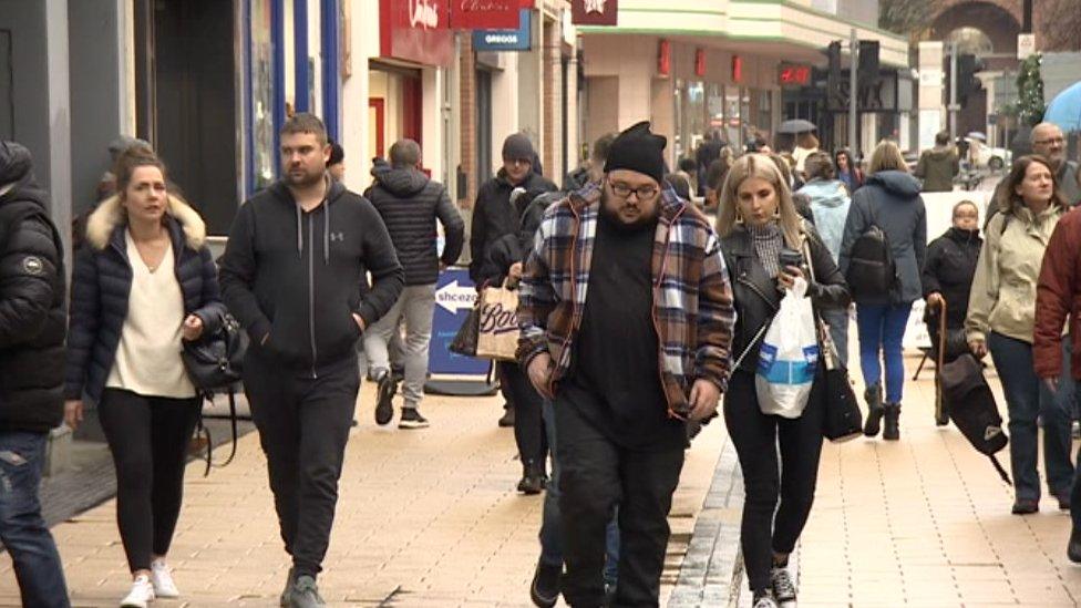 Shoppers in Bristol.