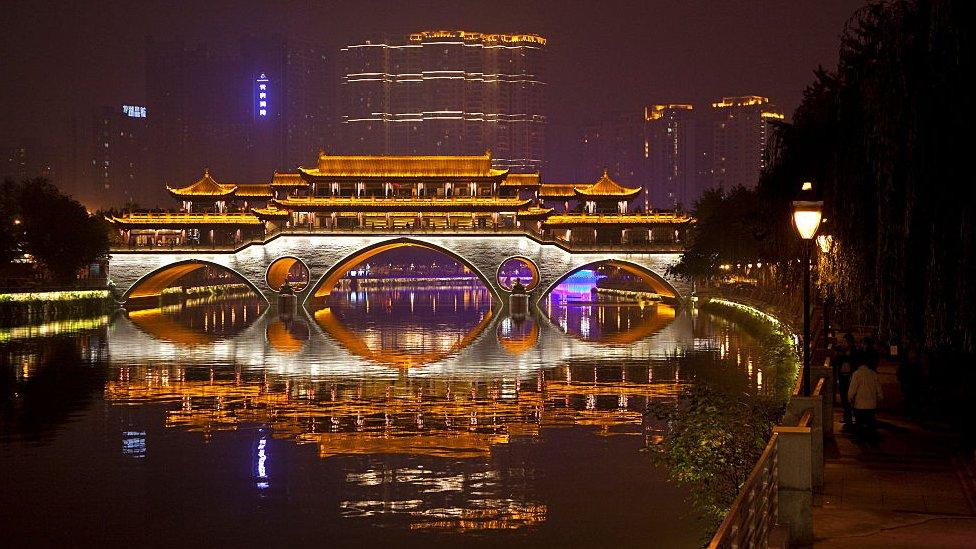 Illuminated Anshun Bridge over the Jin River at night in the provincial capital of Chengdu in Sichuan