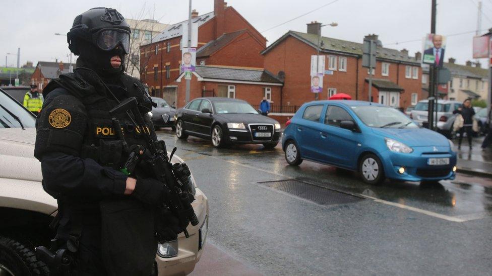 An armed police officer on patrol in north inncer city Dublin