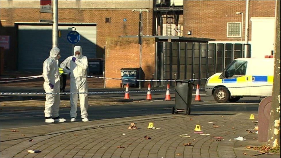 forensics officers inside a police cordon at Princess Way