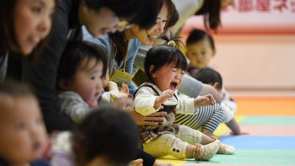 File image of mothers and children in Japan