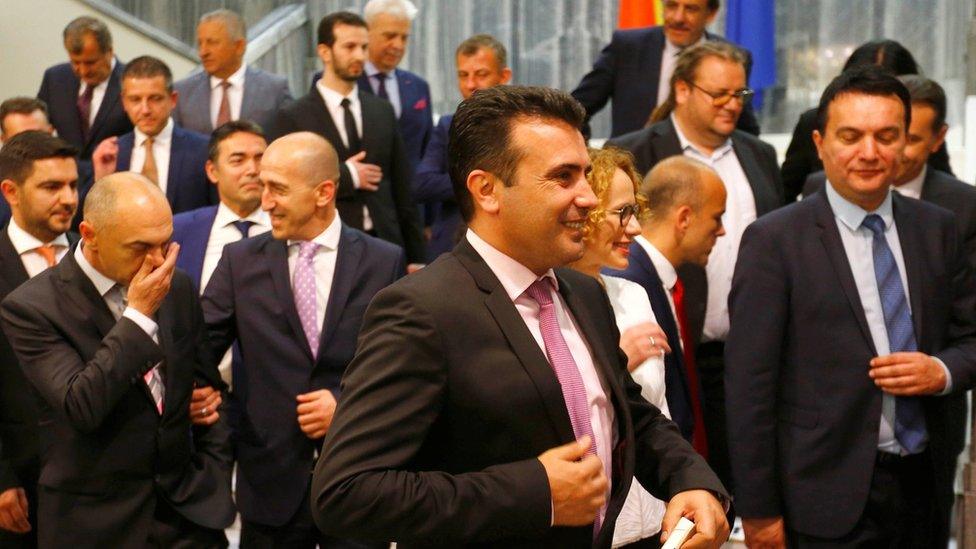 Social Democrat leader Zoran Zaev (C) poses for photo with newly elected ministers at Macedonian parliament in Skopje, June 1, 2017