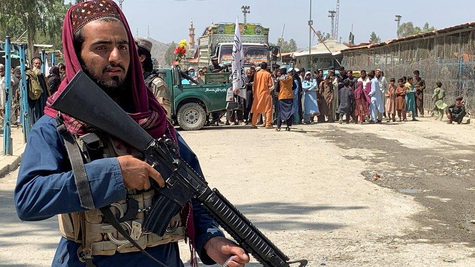 A member of the Taliban forces stands guard during an organised media tour to the Pakistan-Afghanistan crossing border, in Torkham, Pakistan September 2, 2021.