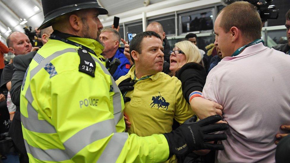 A scuffle broke out as shadow chancellor John McDonnell made his acceptance speech in Hayes and Harlington