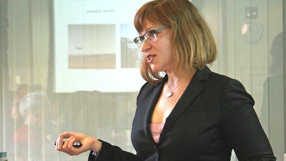 Jacqueline Hazelton giving a lecture at Harvard