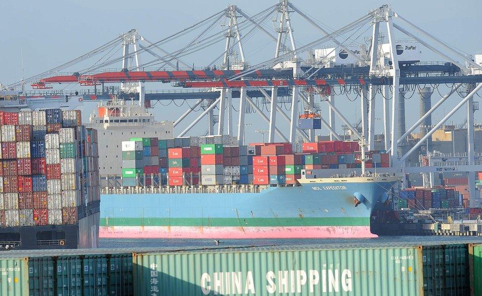 Containers are offloaded from a ship at the Port of Los Angeles in San Pedro, California