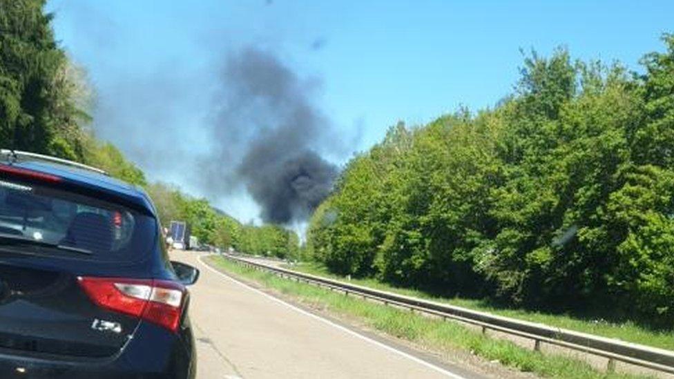 Smoke blowing over the A40