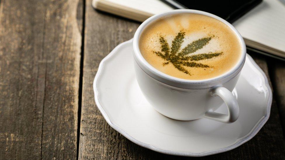 coffee with cannabis leaf design