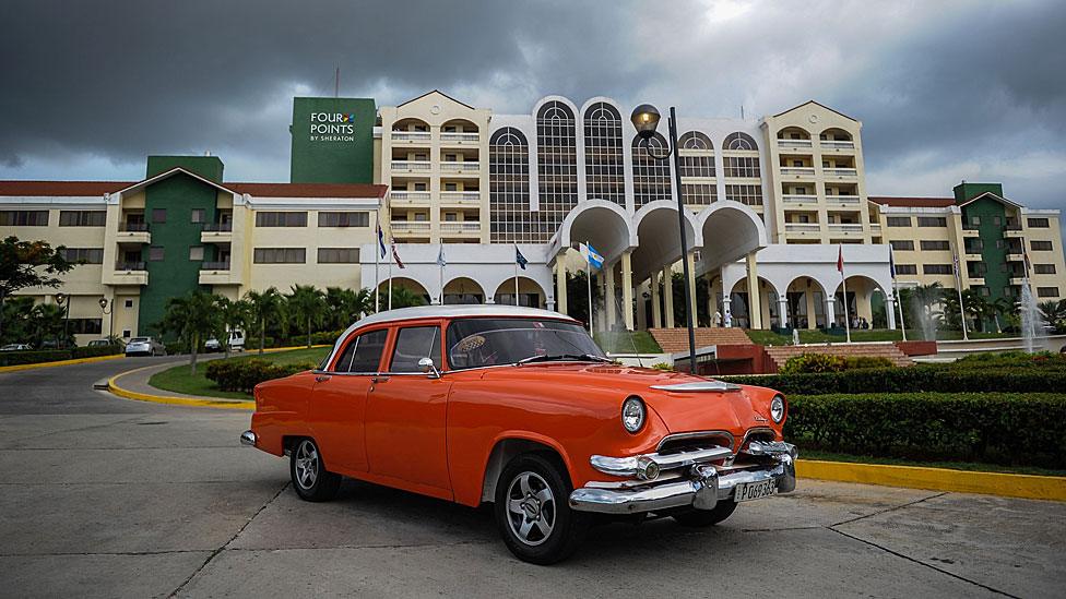 A car outside the Sheraton Hotel